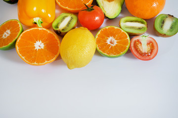 Banner from various vegetables and fruits isolated on white background, top view, creative flat layout. Concept of healthy eating, food background. Frame of vegetables with space for text.