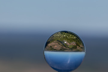 Crystal ball with view of landscape at river Nahe