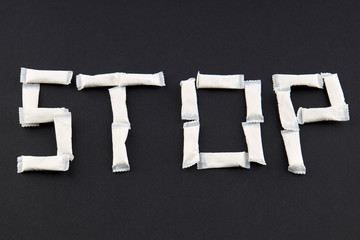 word stop made by snus nicotine tobacco product. no smoking concept.