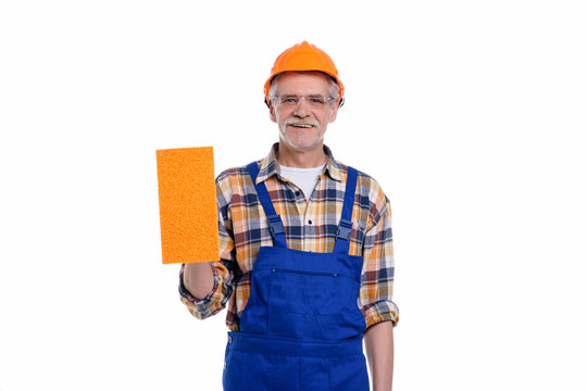  Repair service and renovation concept. Handyman home repair, male in helmet laborer on white background. Repair workshop