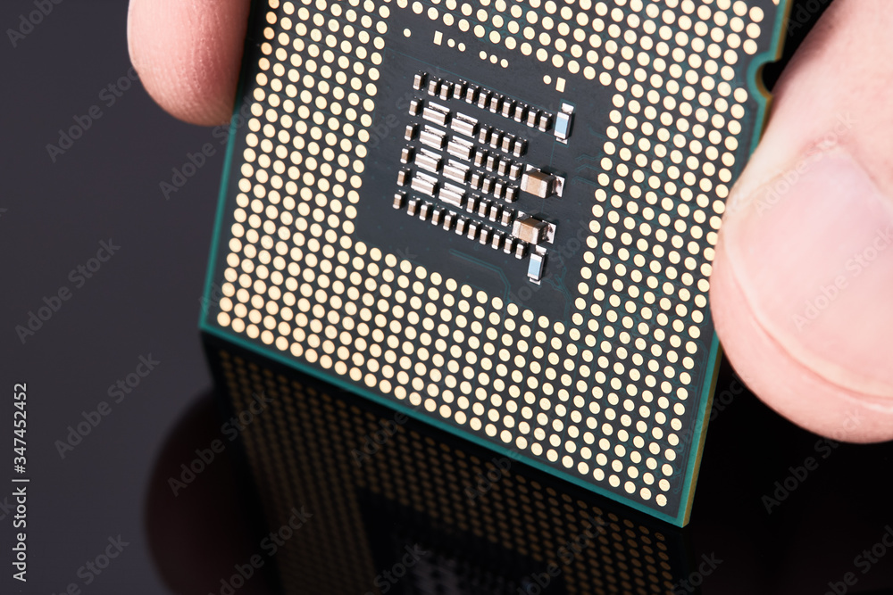 Poster cpu. production of microchips and processors for electronics. on a dark background. computer industr