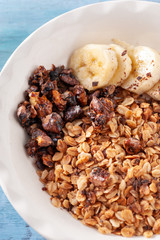 Healthy and delicious breakfast, granola with bananas and yogurt
