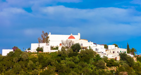 Santa Eularia des Riu, Ibiza / Spain - March 29, 2013: Skyline view of the hilltop village