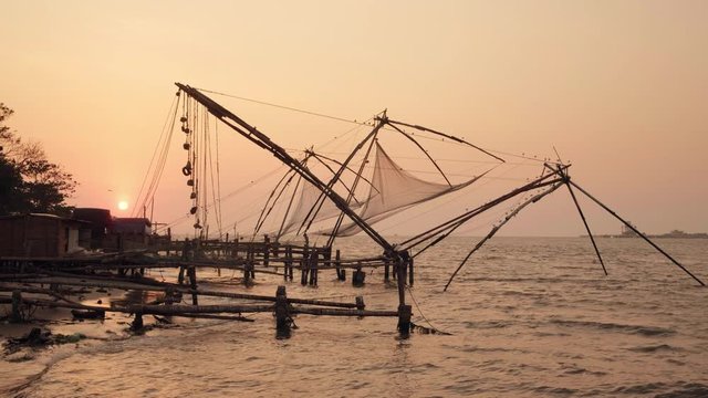 Chinese fishing net at sunrise in Cochin, Kerala, India