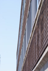 art deco factory windows with sky