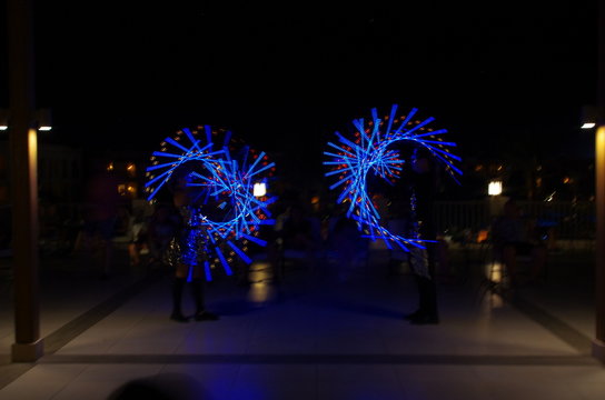 Dancing With Light Sticks At Night