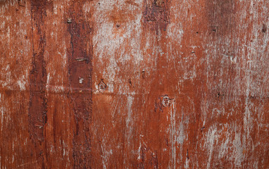 Closeup old and peeling painted wood board background