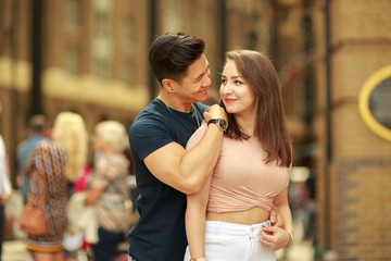 Fototapeta premium happy young couple hugging