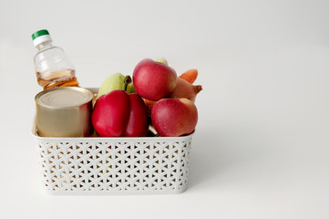 set of products from vegetables in a basket on the table