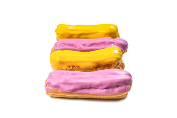 Fresh tasty eclairs isoalted on white background