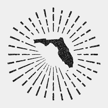 Vintage map of Florida. Grunge sunburst around the us state. Black Florida shape with sun rays on white background. Vector illustration.