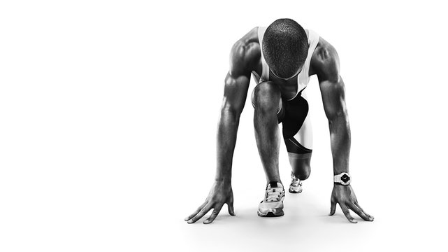 Sports background. Runner on the start. Black and white image isolated on white. 