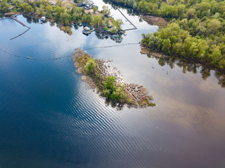 A small island on the river. Arial drone view.