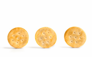 Front view of three crackers arrange in a row isolate on white background.