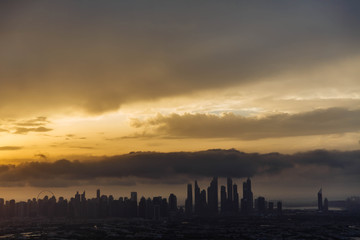 The beauty panorama of skyscrapers in Dubai Marina. UAE. Sunset over Dubai, aerial skyline.