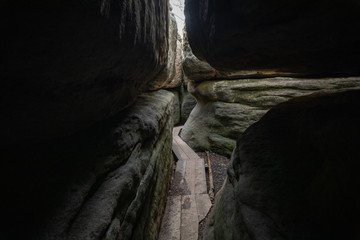 Stolowe Mountains National Park. Wooden boardwalk in Rock Labyrinth hiking trail Bledne Skaly near Kudowa-Zdroj, Lower Silesia, Poland.
