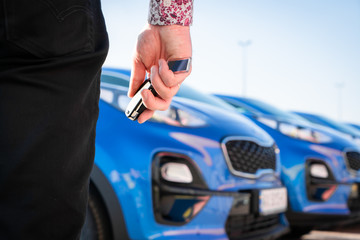 Blue business car with shiny front lights color bright