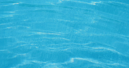 Swimming pool water texture in blue color