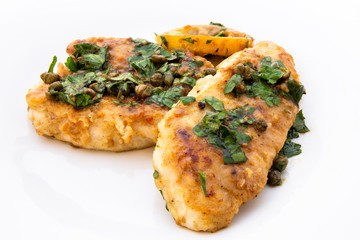 Italian food Lemon chicken Piccata with parsley