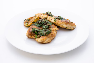 Italian food Lemon chicken Piccata with parsley