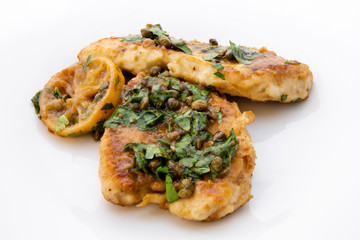 Italian food Lemon chicken Piccata with parsley