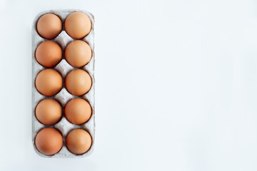 Organic chicken eggs - fresh from producer. Top view. Free space for text.
