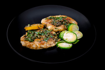 Greek lemon chicken and brussels sprouts with parsley