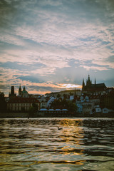 sunset over the Vltava river in Prague.