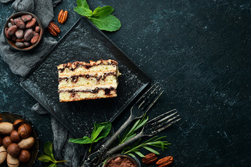 Delicious sweet cake with nuts and chocolate. Top view.