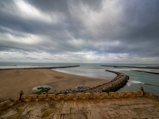Clouds rushing by over the beach of Rabat