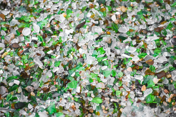 Shells, stones and crystals rounded by the erosion of the sea Los Cristales Beach, Galicia. Spain.