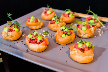 a dish with appetizers at a birthday party