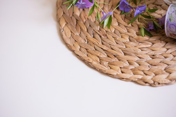 Vase with flowers Periwinkle decorative bucket wicker stand