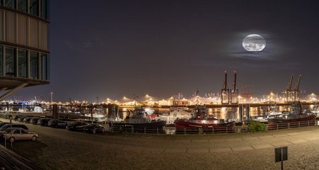 Fototapeta na wymiar Hamburg harbour at night, with many lights