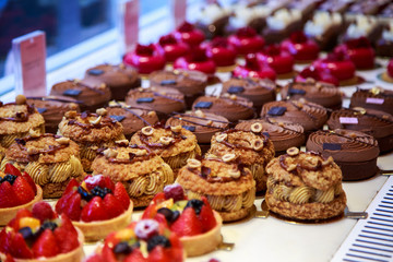 a selection of cakes on a counter