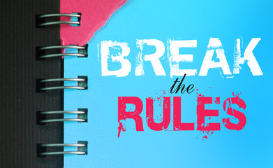 Break the rules text message words on sky blue page of copyybok in white and pink. Lifestyle concept