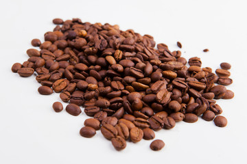 roasted coffee beans on a white background