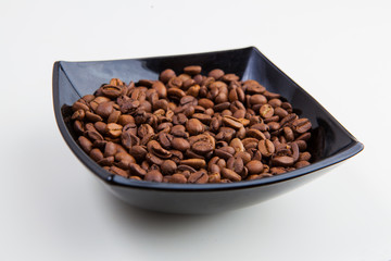 roasted coffee beans on a white background