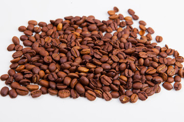 roasted coffee beans on a white background