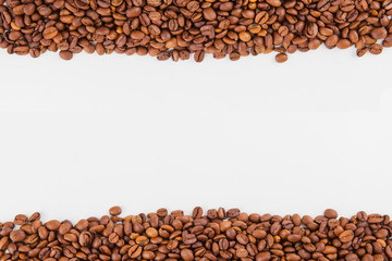 roasted coffee beans on a white background