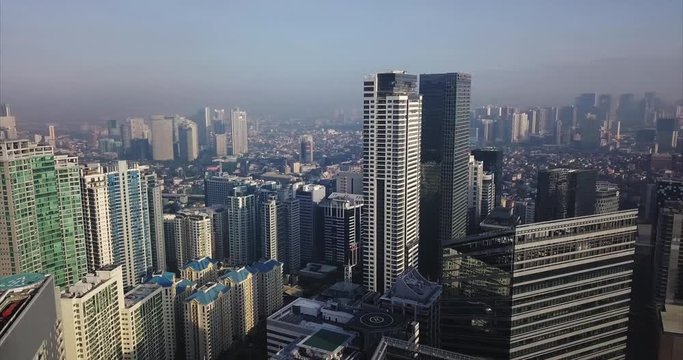 Landscape panorama aerial flight of metropolitan city's skyline. Drone, 4K.