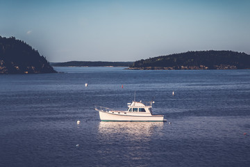 Boat docking in open space with islands