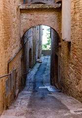 urban alleyway in Montepulciano, Italy