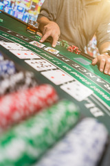 Man playing BlackJack at the casino
