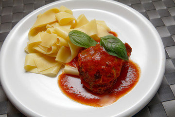 Veal cheeks with tagliatelle noodles and tomato sauce