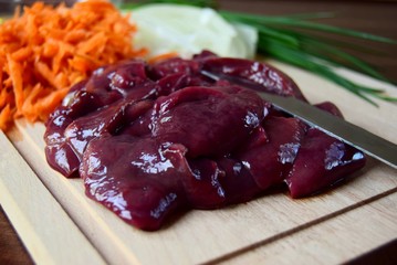 raw meat and vegetables