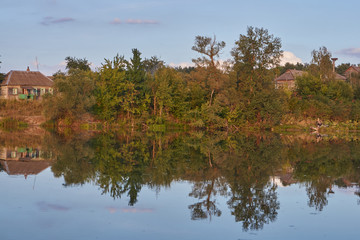 Fototapeta na wymiar Fishing on the lake in the village of Dronovo.