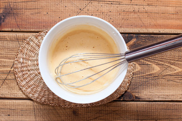 Step-by-step preparation of chicken soup with dumplings, step 4 - preparation of dumpling dough, top view, selective focus