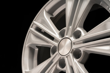 new aluminum alloy wheel, silver color on a black background