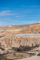 Red Valley and Rose Valley of Goreme of Nevsehir in Cappadocia, Turkey. Red Valley and Rose Valley Cappadocia get their name from the pinkish red-coloured rock